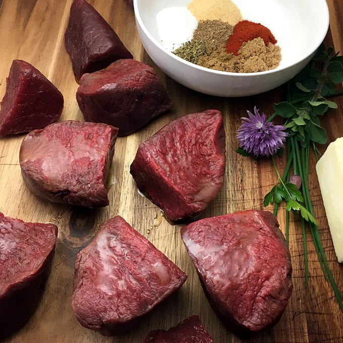 Seasoned Elk Steaks with Herb Butter